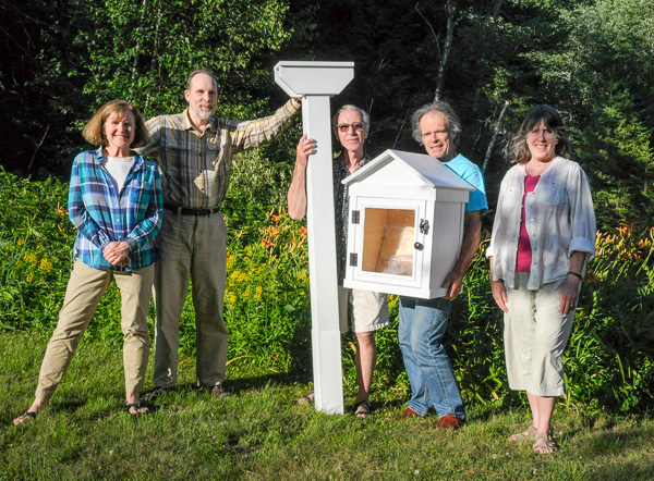 Boardmembers posing with new library